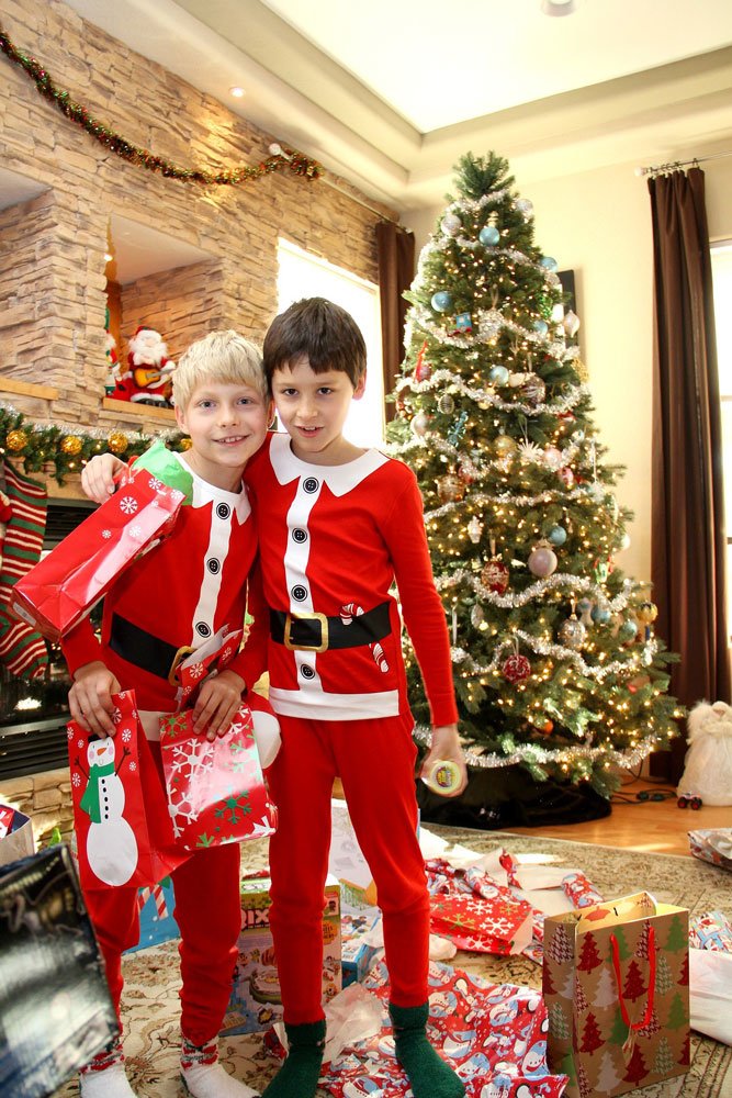 boys near christmas tree